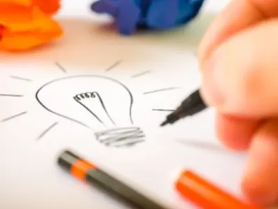 Drawing of light bulb on paper