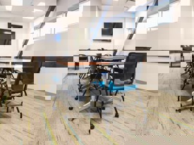 boardroom with tables and chairs